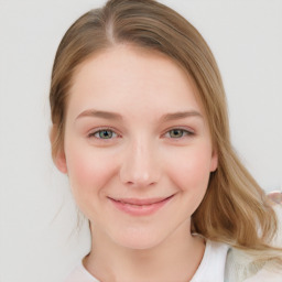 Joyful white young-adult female with medium  brown hair and blue eyes