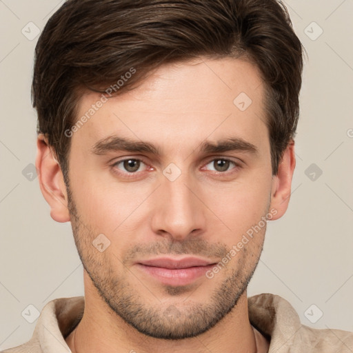 Joyful white young-adult male with short  brown hair and brown eyes