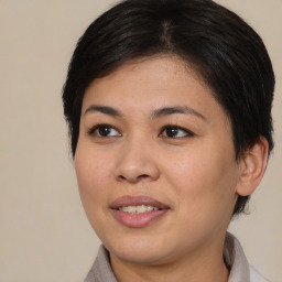 Joyful white young-adult female with medium  brown hair and brown eyes