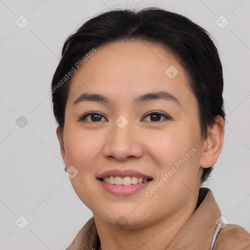 Joyful white young-adult female with short  brown hair and brown eyes