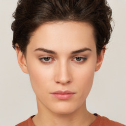 Neutral white young-adult female with short  brown hair and brown eyes