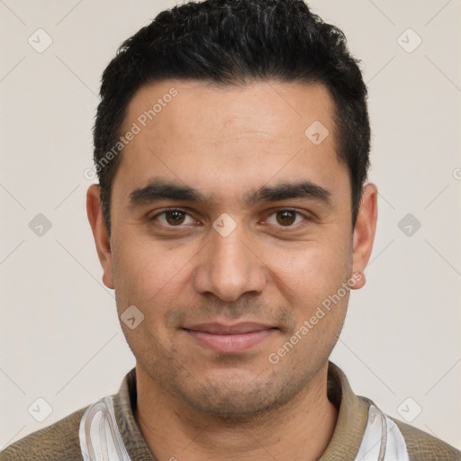 Joyful white young-adult male with short  black hair and brown eyes