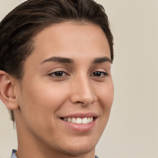 Joyful white young-adult female with short  brown hair and brown eyes