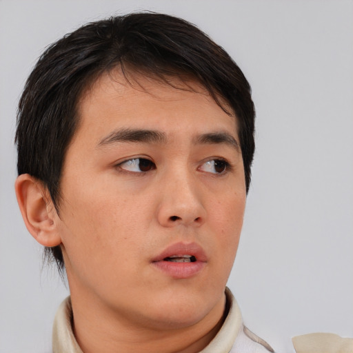 Neutral asian young-adult male with short  brown hair and brown eyes