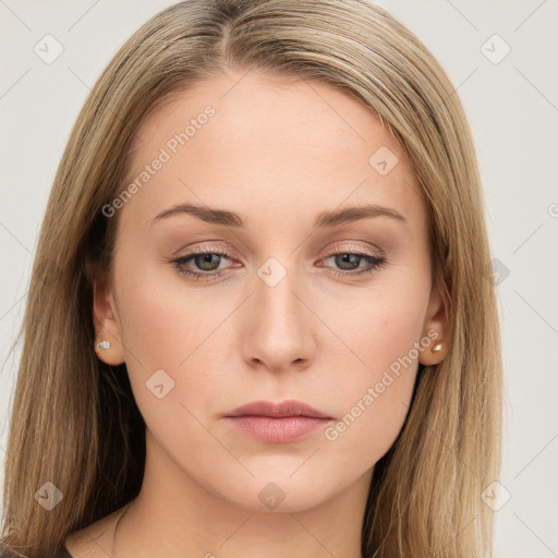 Neutral white young-adult female with long  brown hair and brown eyes