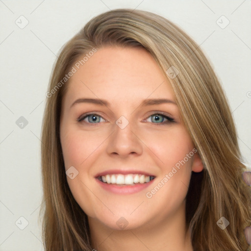 Joyful white young-adult female with long  brown hair and blue eyes