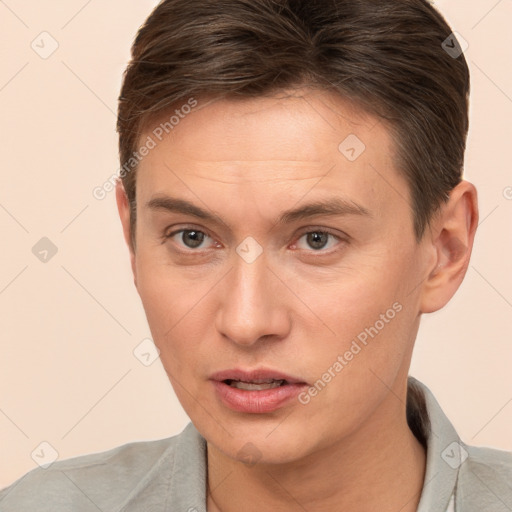 Neutral white young-adult male with short  brown hair and brown eyes