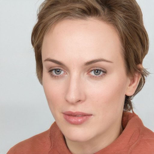 Neutral white young-adult female with medium  brown hair and grey eyes