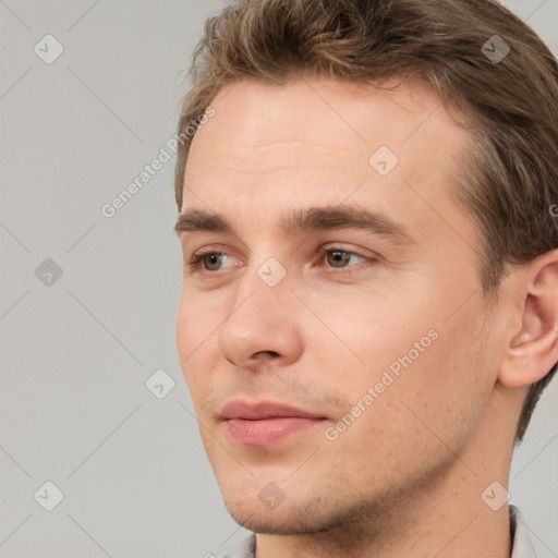 Neutral white young-adult male with short  brown hair and brown eyes