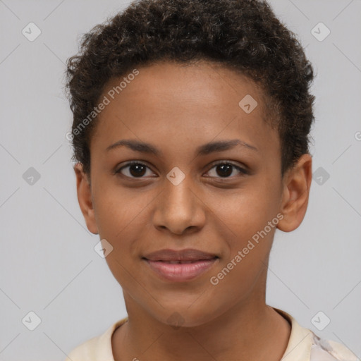 Joyful black young-adult female with short  brown hair and brown eyes