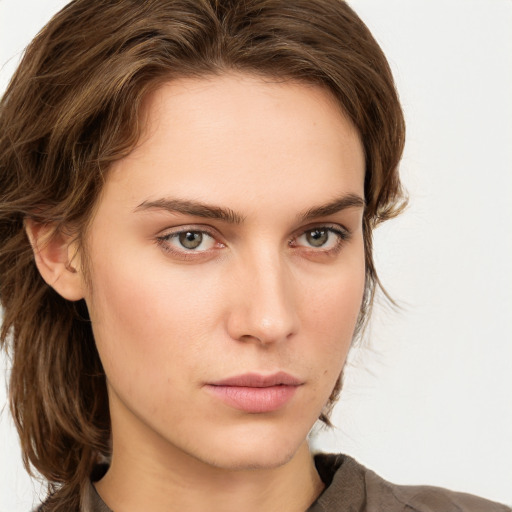 Neutral white young-adult female with medium  brown hair and green eyes