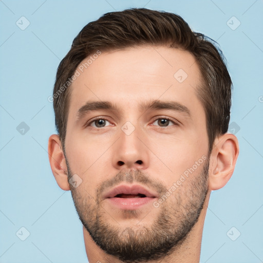 Neutral white young-adult male with short  brown hair and brown eyes