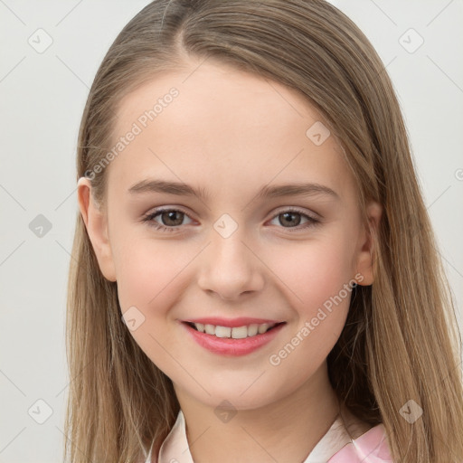 Joyful white child female with long  brown hair and brown eyes