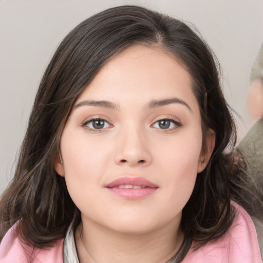 Neutral white young-adult female with medium  brown hair and brown eyes