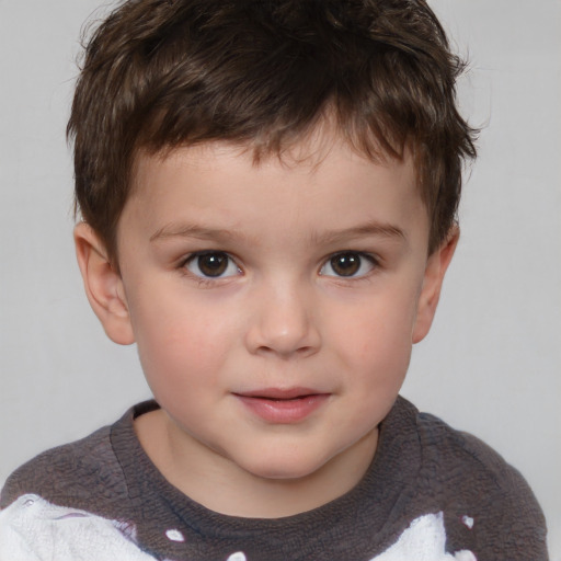 Joyful white child male with short  brown hair and brown eyes