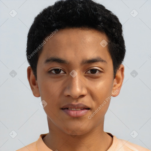 Joyful latino young-adult male with short  black hair and brown eyes