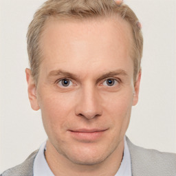Joyful white adult male with short  brown hair and grey eyes