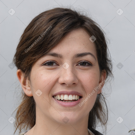 Joyful white young-adult female with medium  brown hair and grey eyes