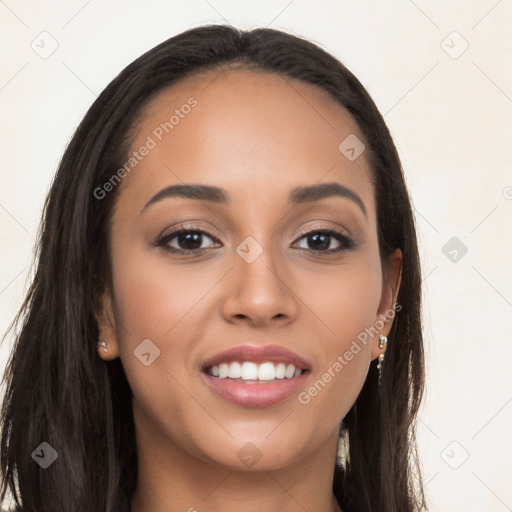 Joyful latino young-adult female with long  brown hair and brown eyes