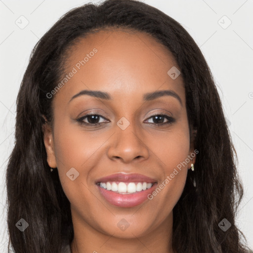 Joyful latino young-adult female with long  brown hair and brown eyes