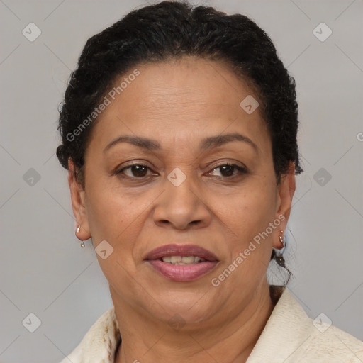 Joyful latino adult female with short  brown hair and brown eyes