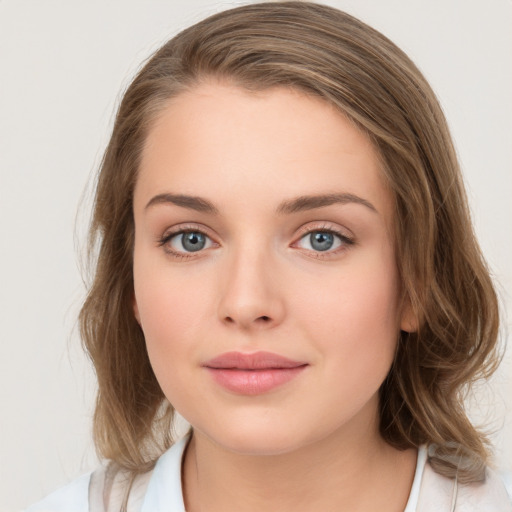 Neutral white young-adult female with medium  brown hair and blue eyes