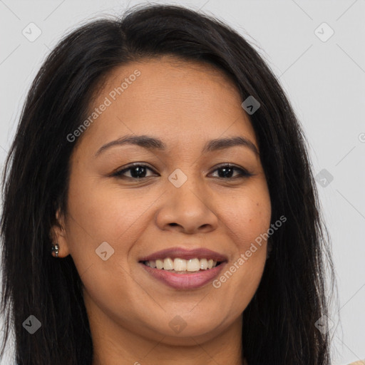 Joyful latino young-adult female with long  brown hair and brown eyes