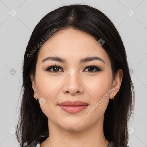 Joyful latino young-adult female with medium  black hair and brown eyes