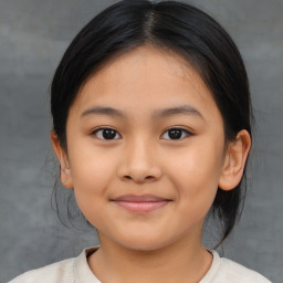 Joyful asian child female with medium  brown hair and brown eyes