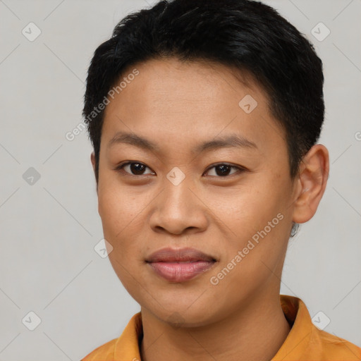 Joyful asian young-adult female with short  black hair and brown eyes