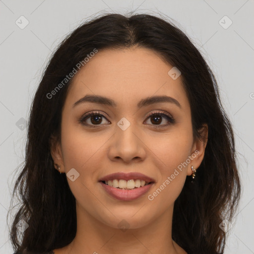 Joyful latino young-adult female with long  brown hair and brown eyes