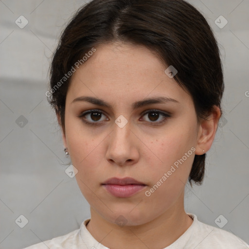 Neutral white young-adult female with medium  brown hair and brown eyes