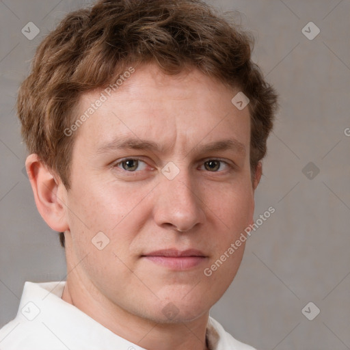 Neutral white young-adult male with short  brown hair and grey eyes