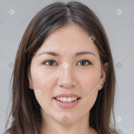 Joyful white young-adult female with long  brown hair and brown eyes