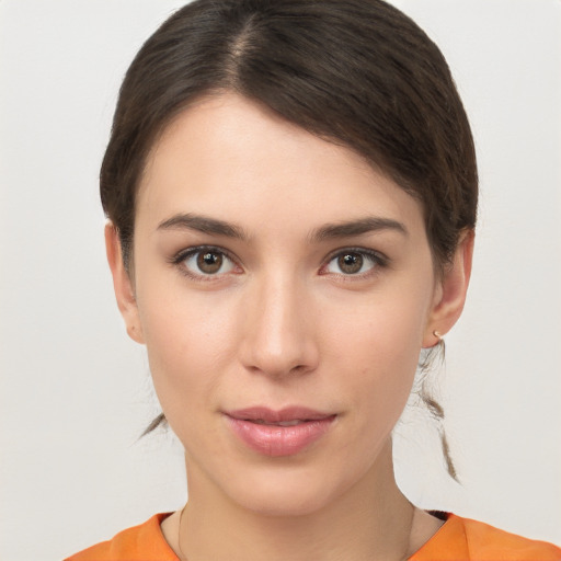 Neutral white young-adult female with medium  brown hair and brown eyes