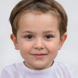 Joyful white child male with short  brown hair and brown eyes