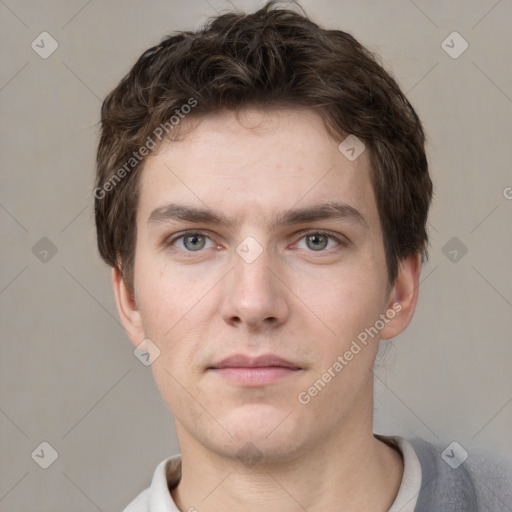 Neutral white young-adult male with short  brown hair and grey eyes