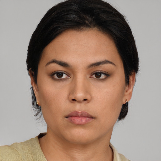 Neutral asian young-adult female with short  brown hair and brown eyes