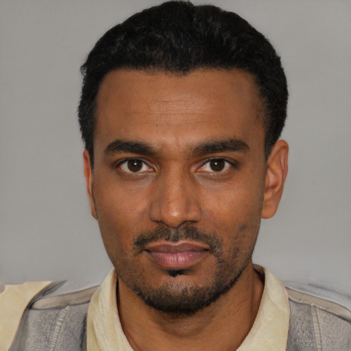 Neutral black young-adult male with short  black hair and brown eyes