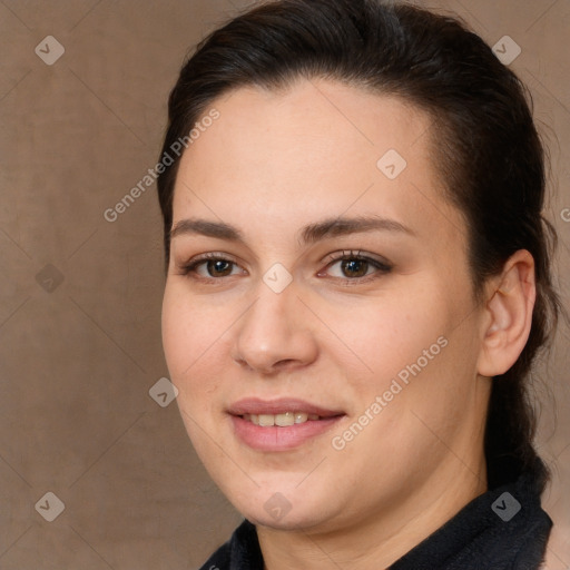 Joyful white young-adult female with long  brown hair and brown eyes