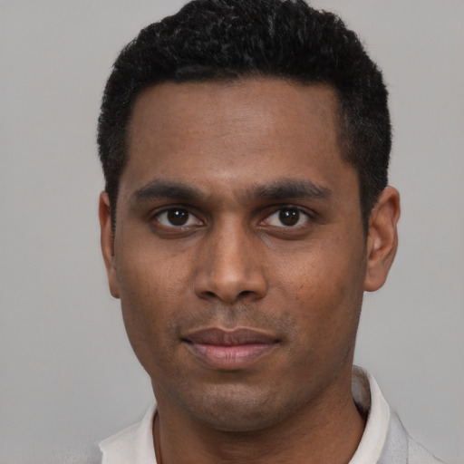 Neutral black young-adult male with short  black hair and brown eyes