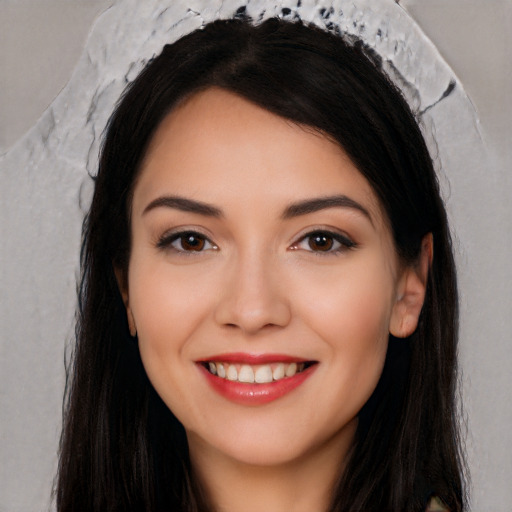 Joyful white young-adult female with long  black hair and brown eyes