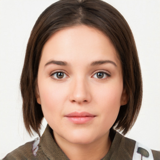 Neutral white young-adult female with medium  brown hair and brown eyes