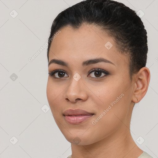 Joyful latino young-adult female with short  brown hair and brown eyes