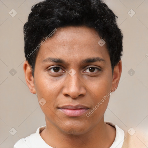 Joyful black young-adult female with short  brown hair and brown eyes