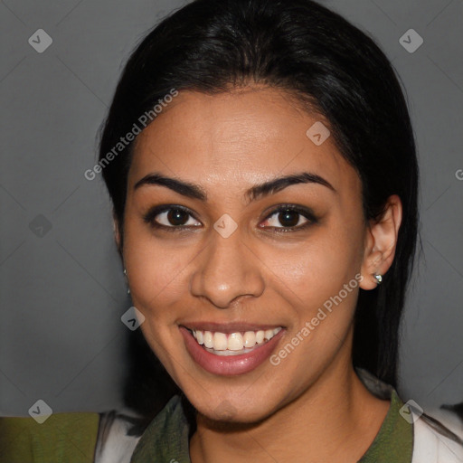 Joyful latino young-adult female with medium  brown hair and brown eyes