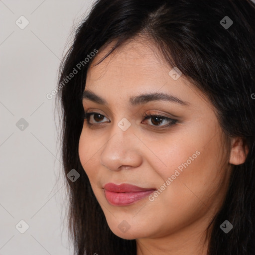 Joyful white young-adult female with long  brown hair and brown eyes