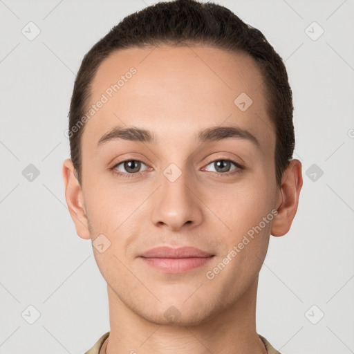 Joyful white young-adult male with short  brown hair and brown eyes