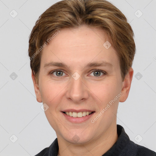 Joyful white adult female with short  brown hair and grey eyes