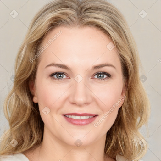 Joyful white young-adult female with medium  brown hair and blue eyes